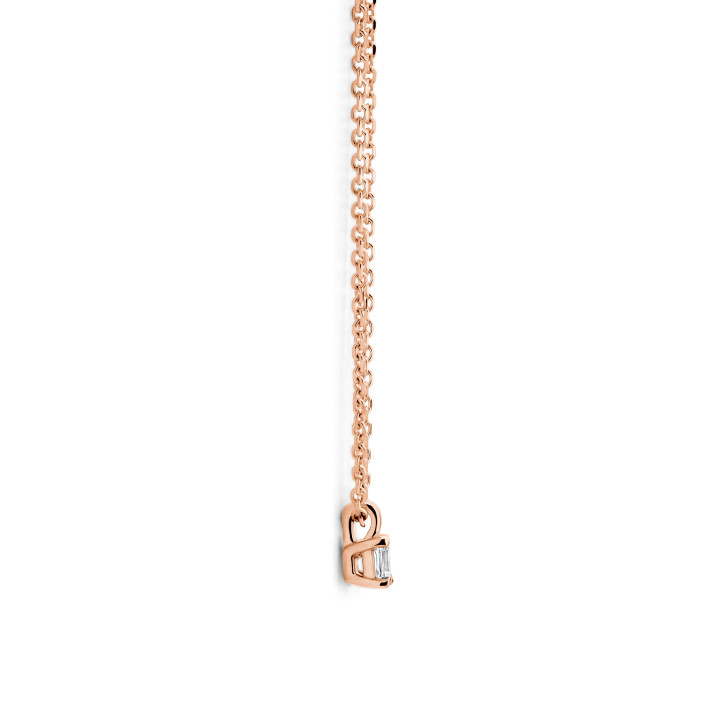 0.15 carat solitaire pendant with a emerald cut diamond in red gold
