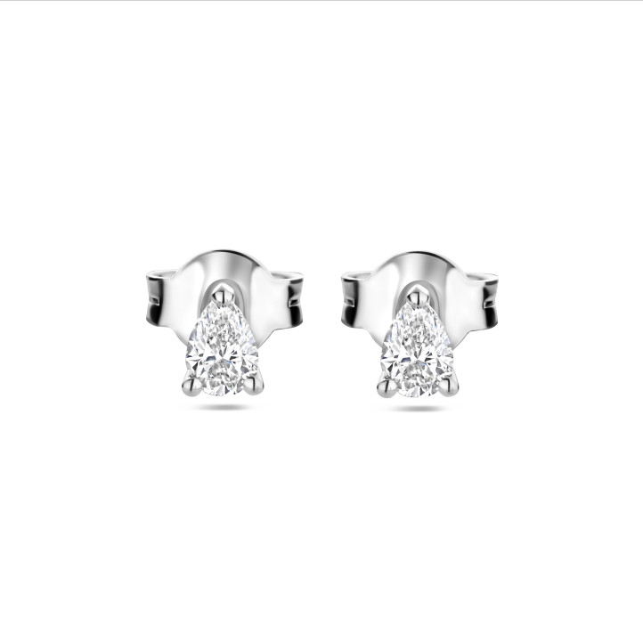 0.30 carat solitaire earrings with pear cut diamonds in white gold