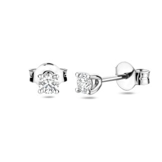 Earrings - 0.30 carat solitaire earrings with round cut diamonds in white gold