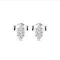 0.30 carat solitaire earrings with Marquise cut diamonds in white gold