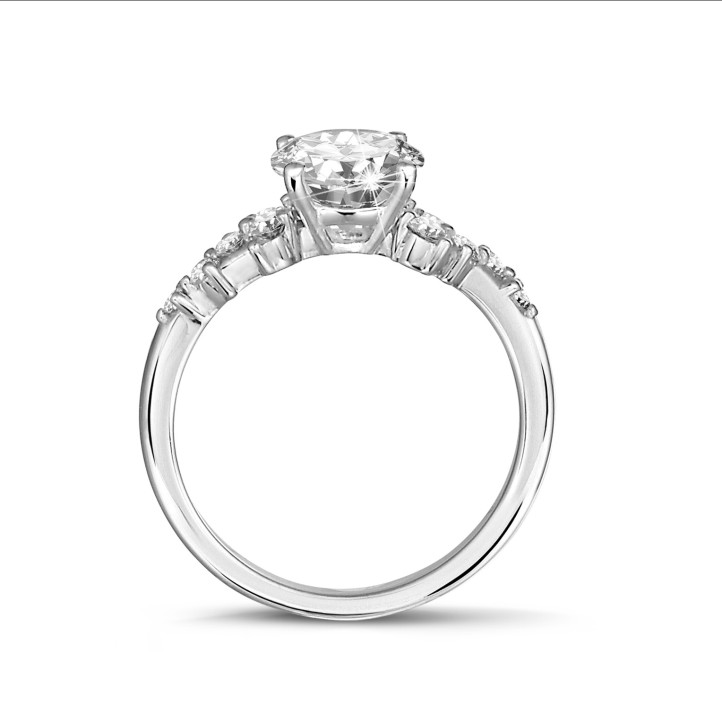 0.70 carat solitaire cluster ring in white gold with a round diamond