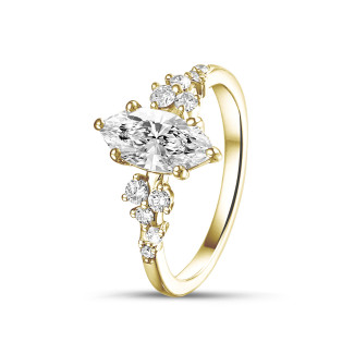 0.70 carat solitaire cluster ring in yellow gold with marquise diamond