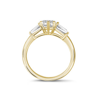 2.00 carat trilogy ring in yellow gold with marquise diamond and tapered baguettes