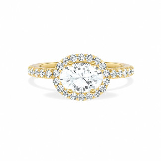Bespoke oval halo ring with an east-west center diamond