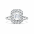 Bespoke emerald cut diamond ring with a double halo