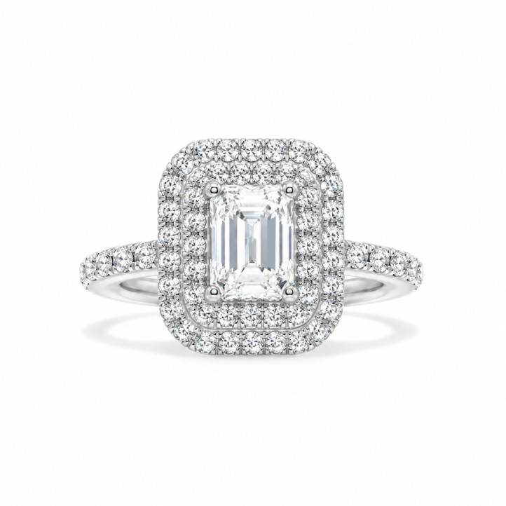 Bespoke emerald cut diamond ring with a double halo