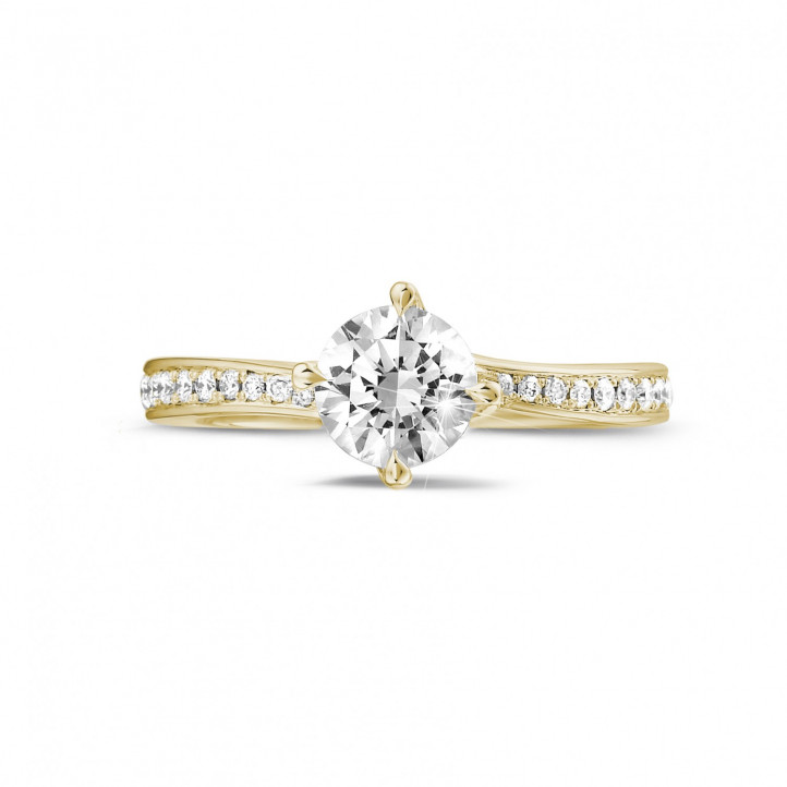 0.70 carat solitaire diamond ring in yellow gold with side diamonds