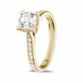 1.00 carat solitaire diamond ring in yellow gold with side diamonds