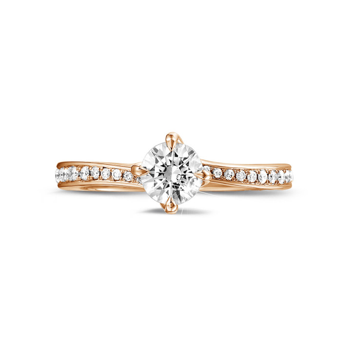 0.50 carat solitaire diamond ring in red gold with side diamonds