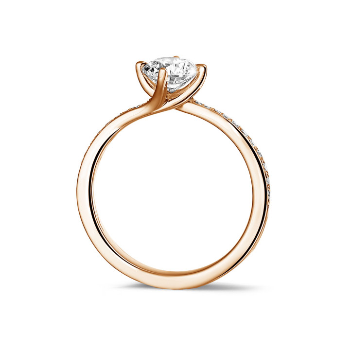 0.70 carat solitaire diamond ring in red gold with side diamonds