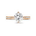 1.50 carat solitaire diamond ring in red gold with side diamonds