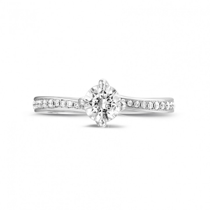 0.50 carat solitaire diamond ring in platinum with side diamonds