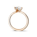 0.90 carat solitaire diamond ring in red gold with side diamonds