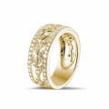 0.35 carat wide floral eternity ring in yellow gold with small round diamonds