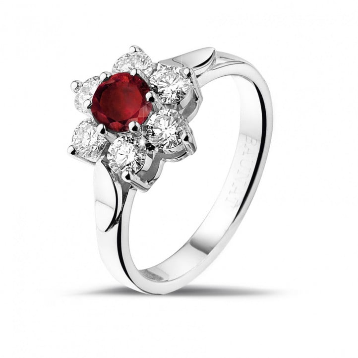 Flower ring in white gold with a round ruby and side diamonds