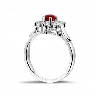 Engagement - Flower ring in white gold with a round ruby and side diamonds