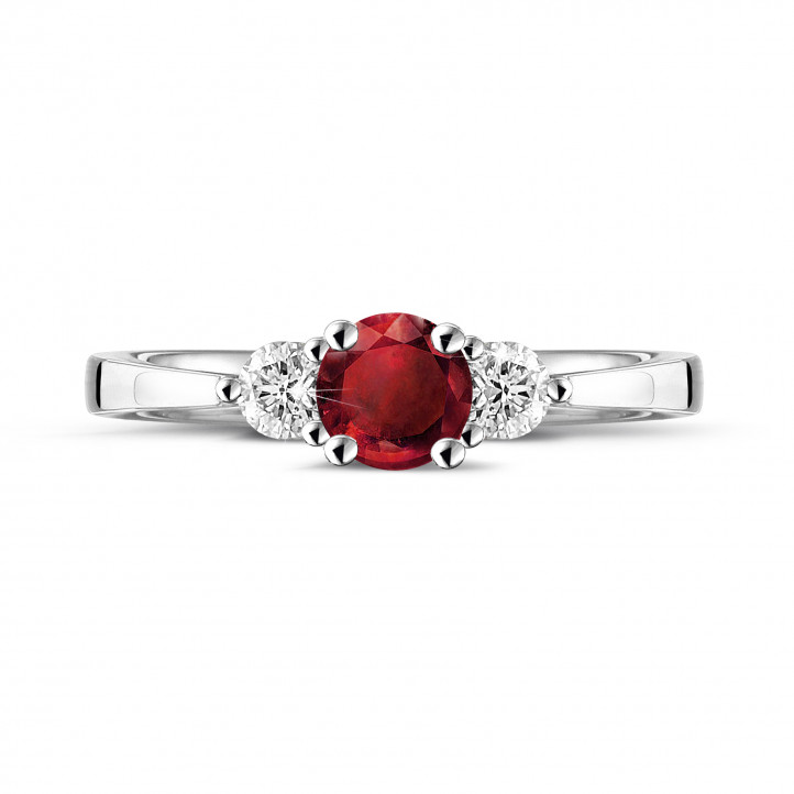 Trilogy ring in white gold with a central ruby and 2 round diamonds