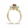 Flower ring in yellow gold with a round ruby and side diamonds