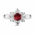Flower ring in platinum with a round ruby and side diamonds