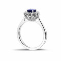 Entourage ring in platinum with an oval sapphire and round diamonds