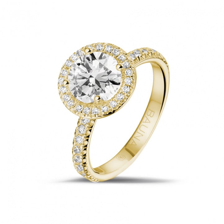 1.50 carat solitaire halo ring in yellow gold with round diamonds