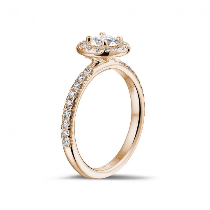 0.50 carat solitaire Halo ring in red gold with round diamonds