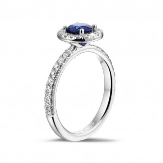 Rings - Halo solitaire ring in white gold with a round sapphire and small diamonds