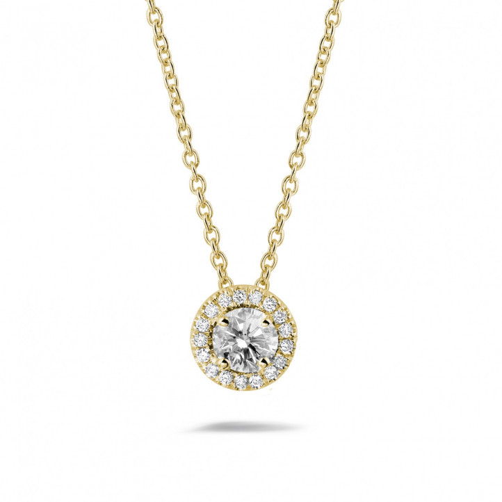 0.50 carat diamond halo necklace in yellow gold