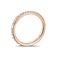 0.35 carat eternity ring (half set) in red gold with round diamonds