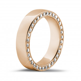 Rings - 0.70 carat eternity ring in red gold with small round diamonds on the side