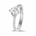 1.00 carat solitaire diamond ring in white gold with side diamonds