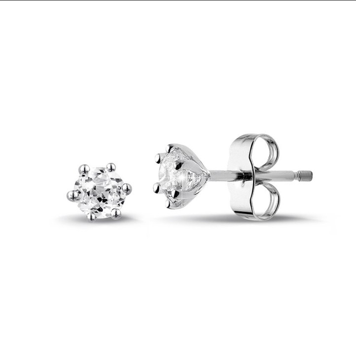 0.60 carat classic diamond earrings in platinum with six prongs