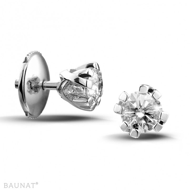 0.60 carat diamond design earrings in platinum with eight prongs
