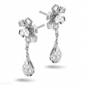 0.90 carat diamond flower earrings in white gold