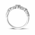 0.32 carat floral eternity ring in white gold with small round diamonds