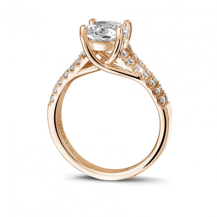 1.50 carat solitaire ring in red gold with side diamonds