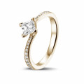0.50 carat solitaire ring in red gold with princess diamond and side diamonds