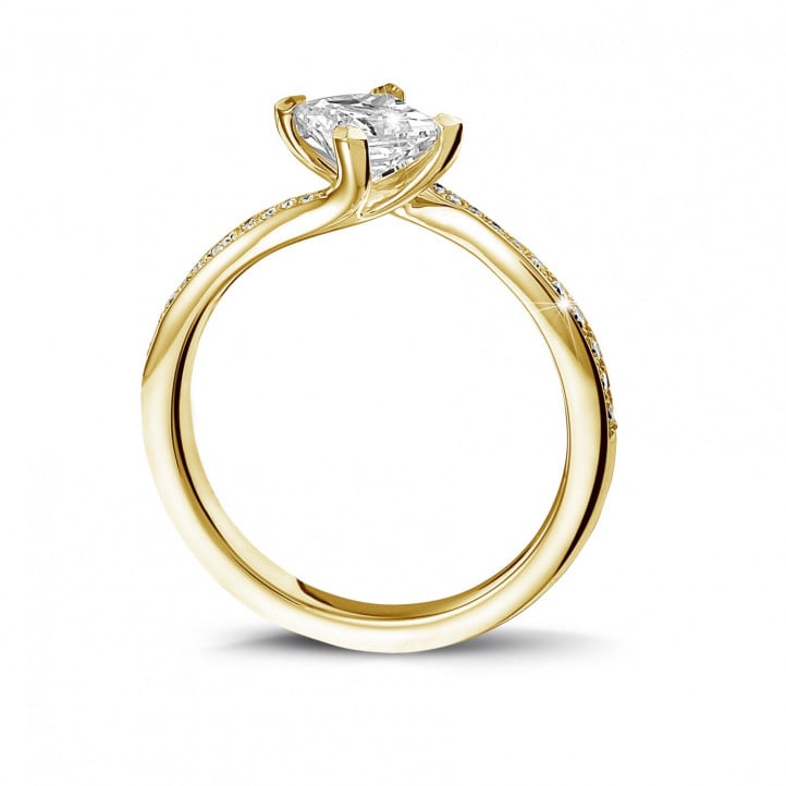 0.70 carat solitaire ring in yellow gold with princess diamond and side diamonds
