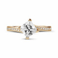 1.20 carat solitaire ring in red gold with princess diamond and side diamonds