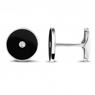 Cufflinks - White golden cufflinks with onyx and a central diamond
