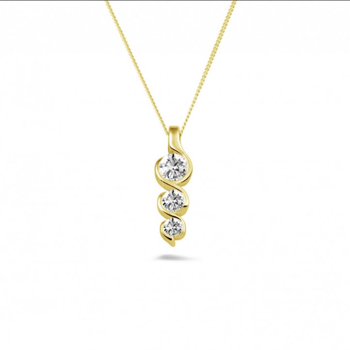 0.57 carat trilogy diamond pendant in yellow gold