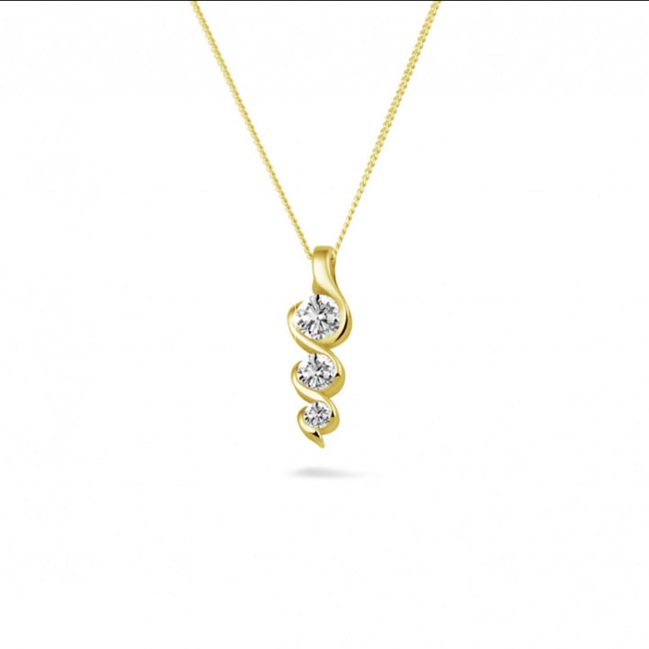 0.38 carat trilogy diamond pendant in yellow gold