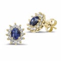 Entourage earrings in yellow gold with oval sapphire and round diamonds