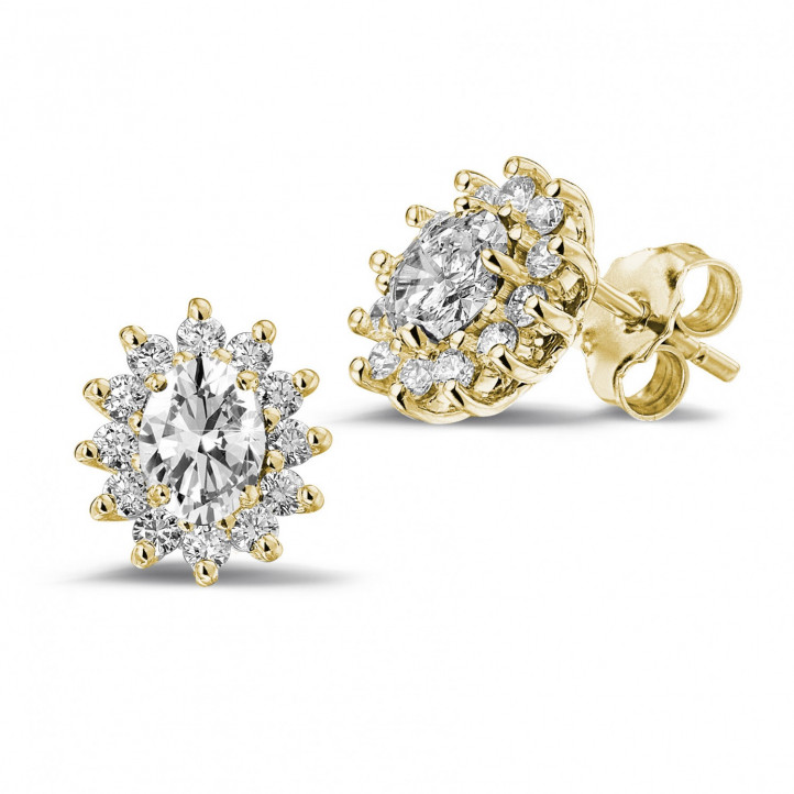 1.75 carat entourage earrings in yellow gold with oval and round diamonds