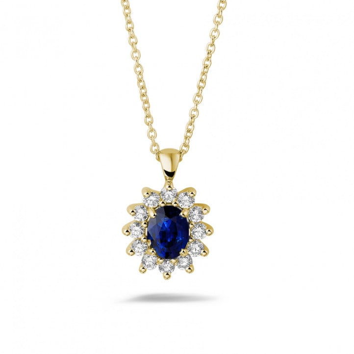 Entourage pendant in yellow gold with oval sapphire and round diamonds