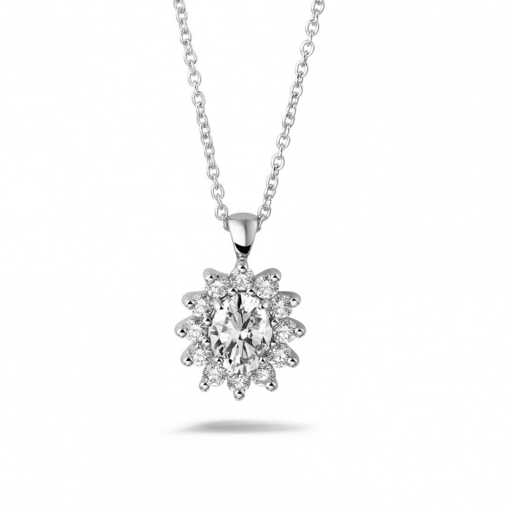 1.85 carat entourage pendant in platinum with oval and round diamonds