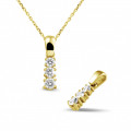 0.45 carat trilogy diamond pendant in yellow gold