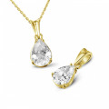 1.00 carat yellow golden solitaire pendant with pear shaped diamond