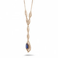 Diamond red golden necklace with a pear shaped sapphire