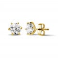 2.00 carat classic diamond earrings in yellow gold with six prongs